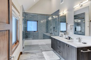 Bathtub, hair dryer, towels, soap