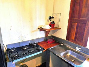 Fridge, stovetop, cookware/dishes/utensils, dining tables