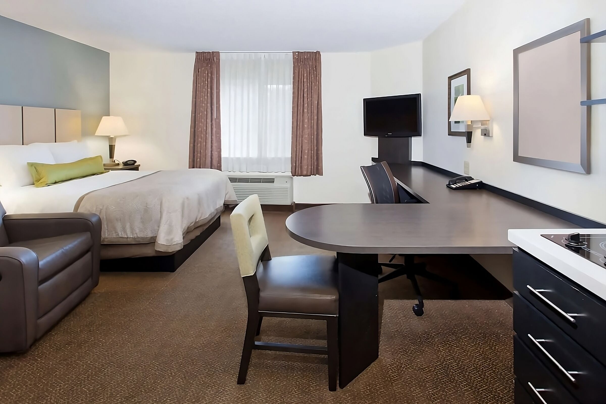 Unwind after work with roomy seating and a dedicated desk.