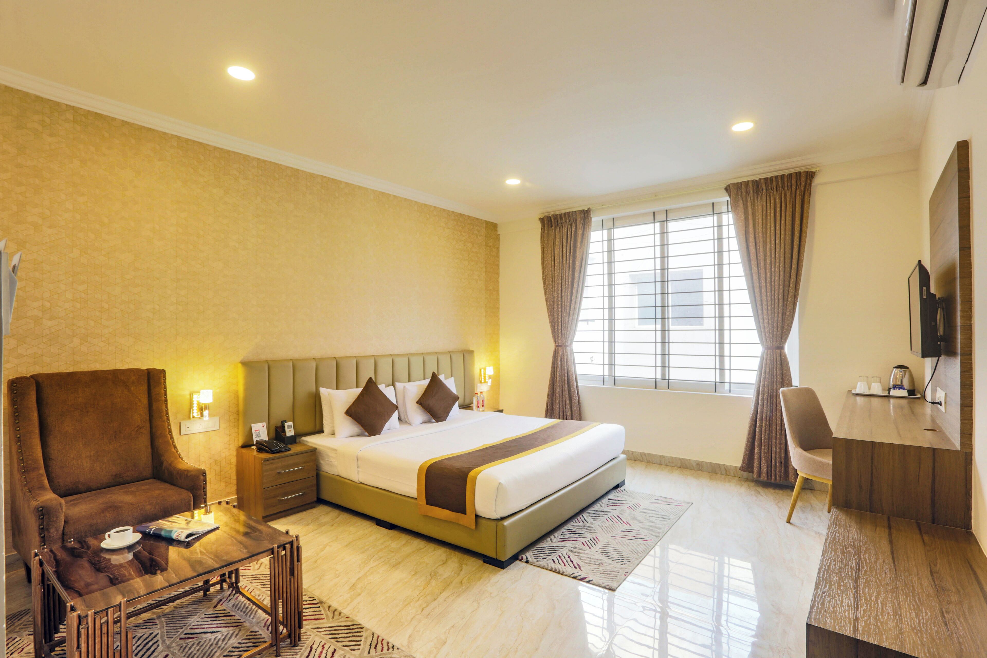 Chambre Deluxe | Draps en coton égyptien, literie de qualité, couette en duvet