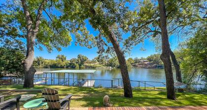 Two-story waterfront retreat with boat dock, two firepits & two kayaks