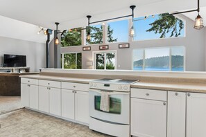 Fridge, microwave, oven, stovetop - Stunning ocean-view home with private waterfront, viewpoint deck & fireplace (La Conner)