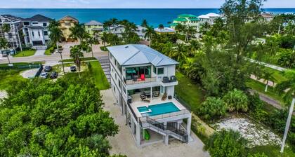 Spacious modern home close to beach with pool, central AC, & washer/dryer