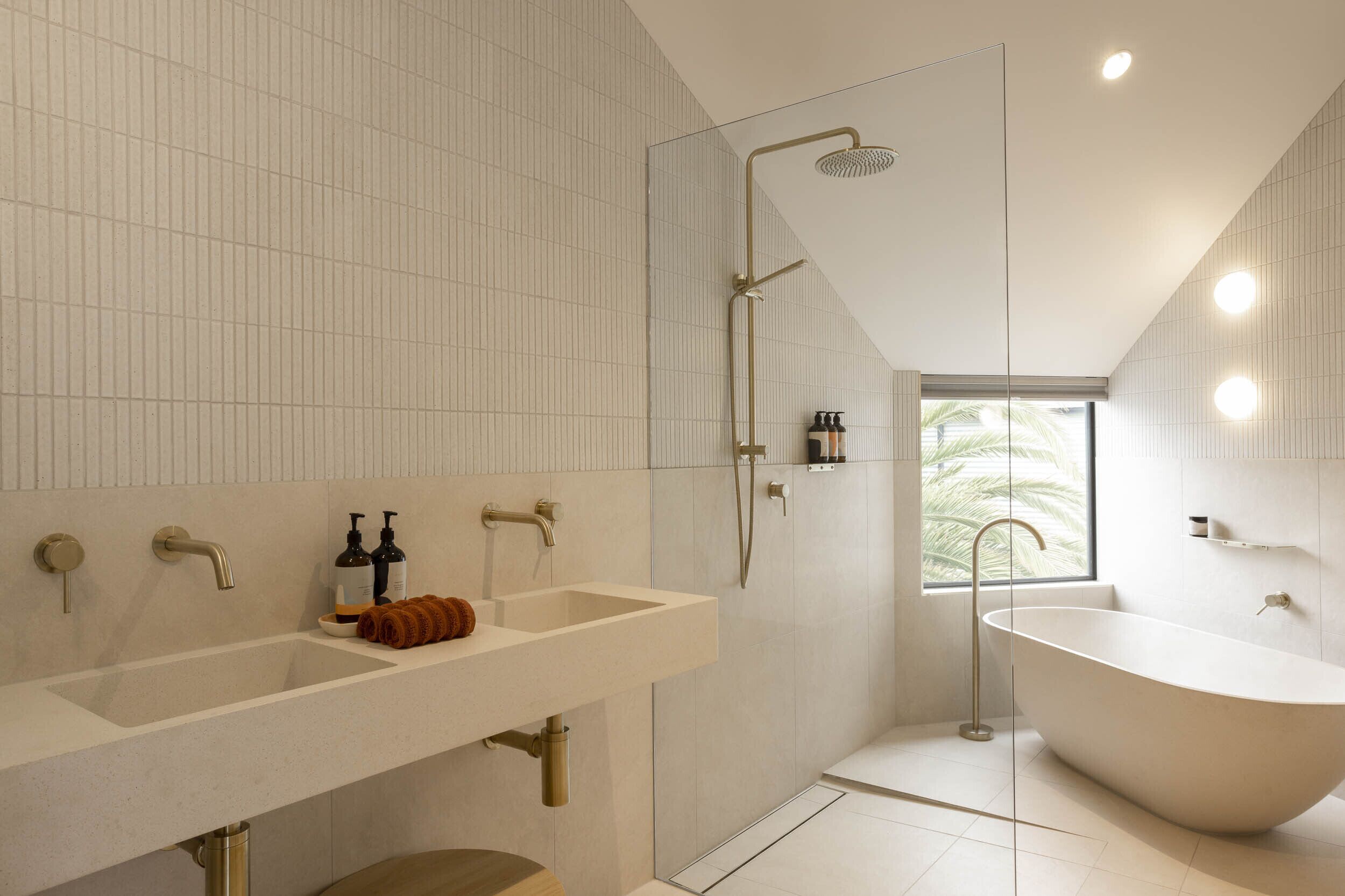 Bathtub, hair dryer, towels, soap