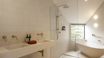 Bathtub, hair dryer, towels, soap