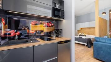 Fridge, microwave, stovetop, coffee/tea maker