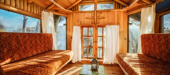 Set in a full green environment with large garden, treehouse and 70a of woodland