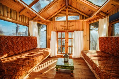 Set in a full green environment with large garden, treehouse and 70a of woodland