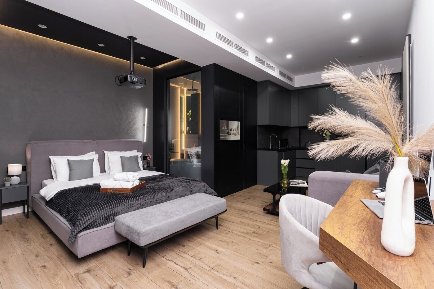 Signature Apartment | Premium bedding, desk, laptop workspace, blackout drapes