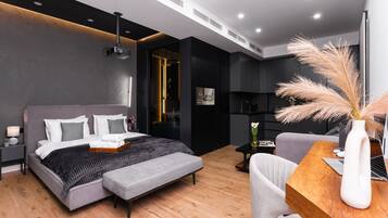 Departamento Prestigio | Área de sala de estar | Smart TV, piso con calefacción y bocina smart