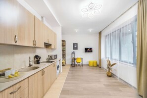 Economy Apartment | Living area | Smart TV, heated floors, smart speakers - Stay Inn on Buzand Str. 97 (Yerevan)