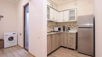 Basic Apartment | Private kitchen | Fridge, stovetop, electric kettle, rice cooker