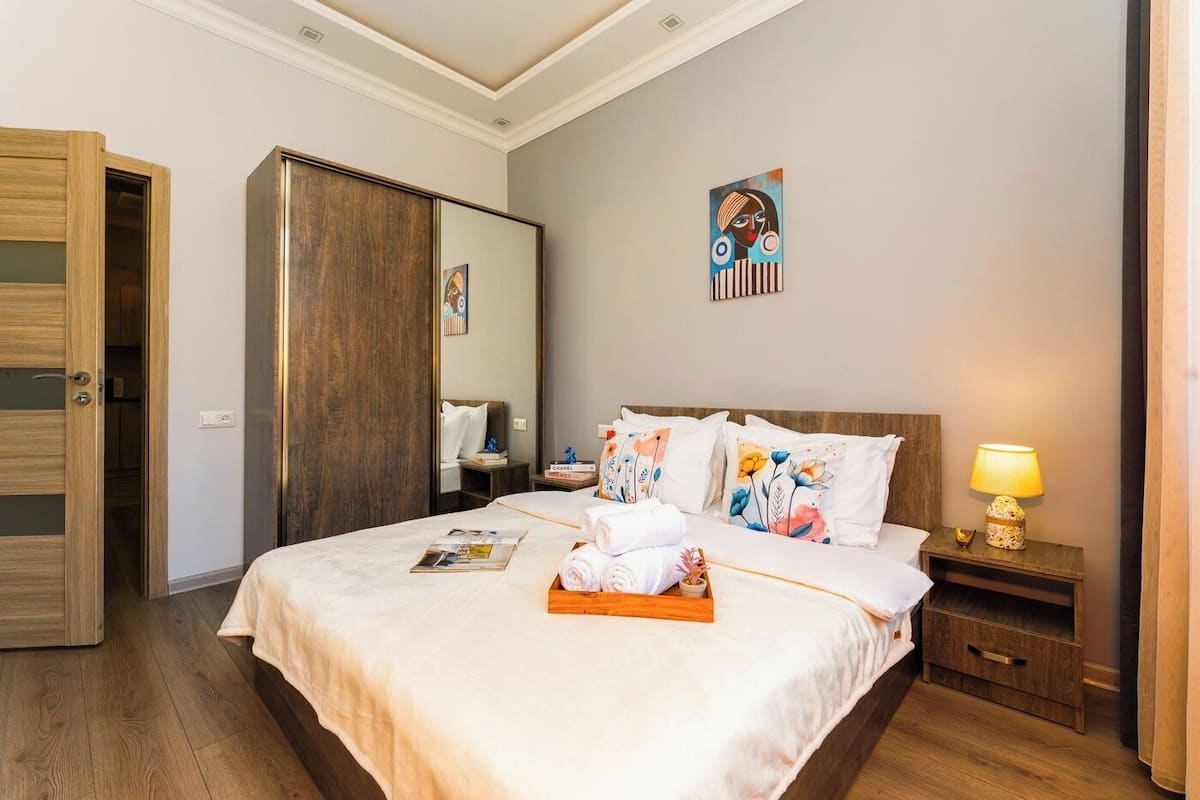 Classic Apartment | Premium bedding, blackout drapes, soundproofing, iron/ironing board
