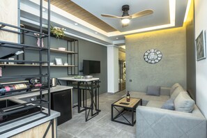 Apartamento exclusivo | Zona de estar | Una televisión de pantalla plana