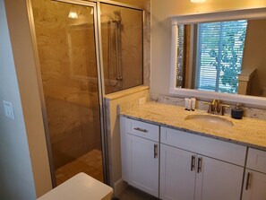 Shower, hair dryer, towels