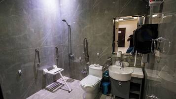 Rainfall showerhead, designer toiletries, hair dryer, slippers