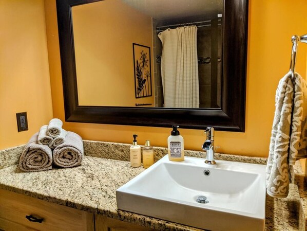 Shower, towels, soap, shampoo