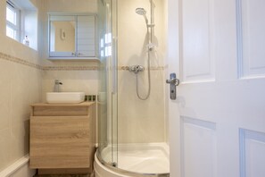 Bathtub, hair dryer, towels