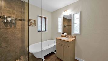 Bathtub, hair dryer, towels, soap