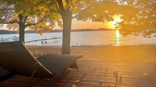 Limited summer dates Lakefront sandy beach, sunroom, sauna, game room, kayaks!