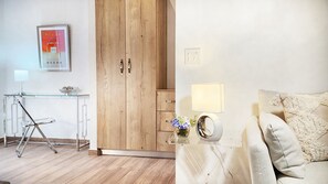 A modern room with a wooden wardrobe, a glass desk with a lamp, and a bed with a textured blanket. - Rio Verde by Villa Alejandro (Los Naranjos)