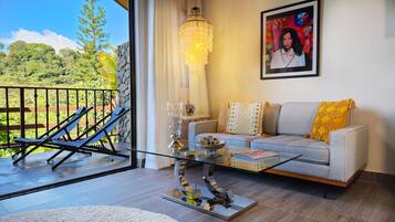 Deluxe Cabin, 1 King Bed, Hot Tub, Ground Floor | Living area | 32-inch Smart TV with digital channels, TV, Netflix