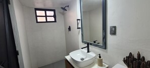 Shower, hair dryer, towels, soap