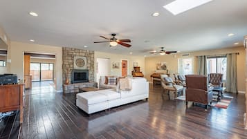 Smart TV, fireplace, foosball, books