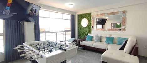 Premium Apartment, 3 Bedrooms, Kitchen, City View | Living area | 55-inch Smart TV with digital channels, Netflix, toys