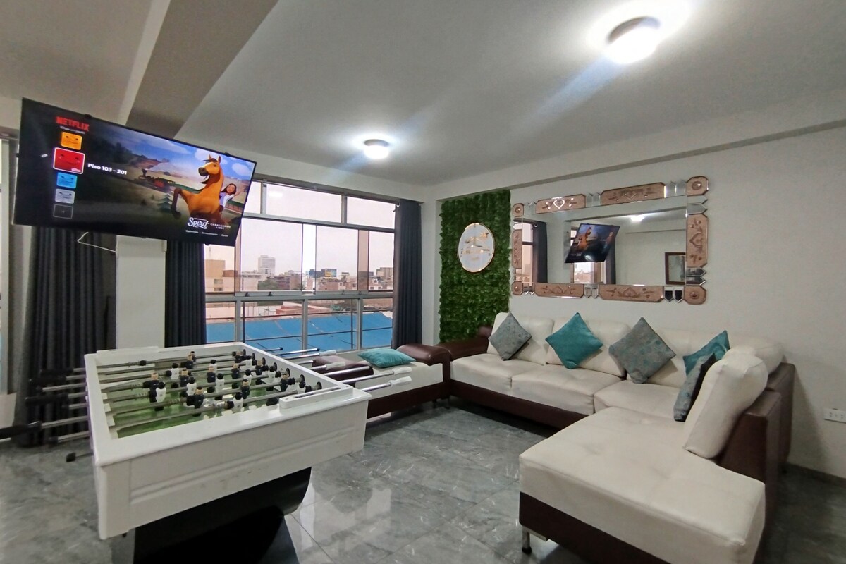 Premium Apartment, 3 Bedrooms, Kitchen, City View | Living area | 55-inch Smart TV with digital channels, Netflix, toys