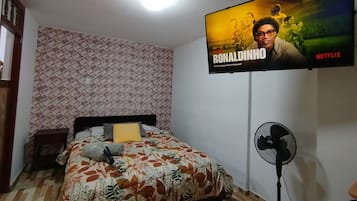 Appartement Classique, 2 chambres, rez-de-chaussée | Literie de qualité supérieure, couette en duvet d'oie, surmatelas