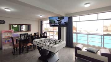 Premium Apartment, 3 Bedrooms, Kitchen, City View | Living area | 55-inch Smart TV with digital channels, Netflix, toys
