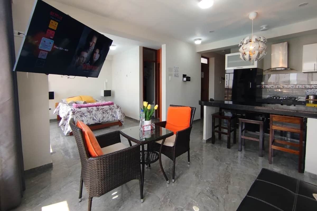 Family Apartment, 2 Bedrooms, Kitchen | Living area | 55-inch Smart TV with digital channels, Netflix, toys