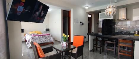 Family Apartment, 2 Bedrooms, Kitchen | Living area | 55-inch Smart TV with digital channels, Netflix, toys
