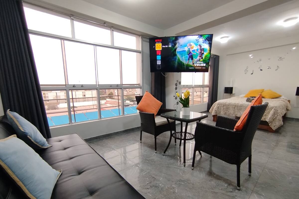 Family Apartment, 2 Bedrooms, Kitchen | Living area | 55-inch Smart TV with digital channels, Netflix, toys