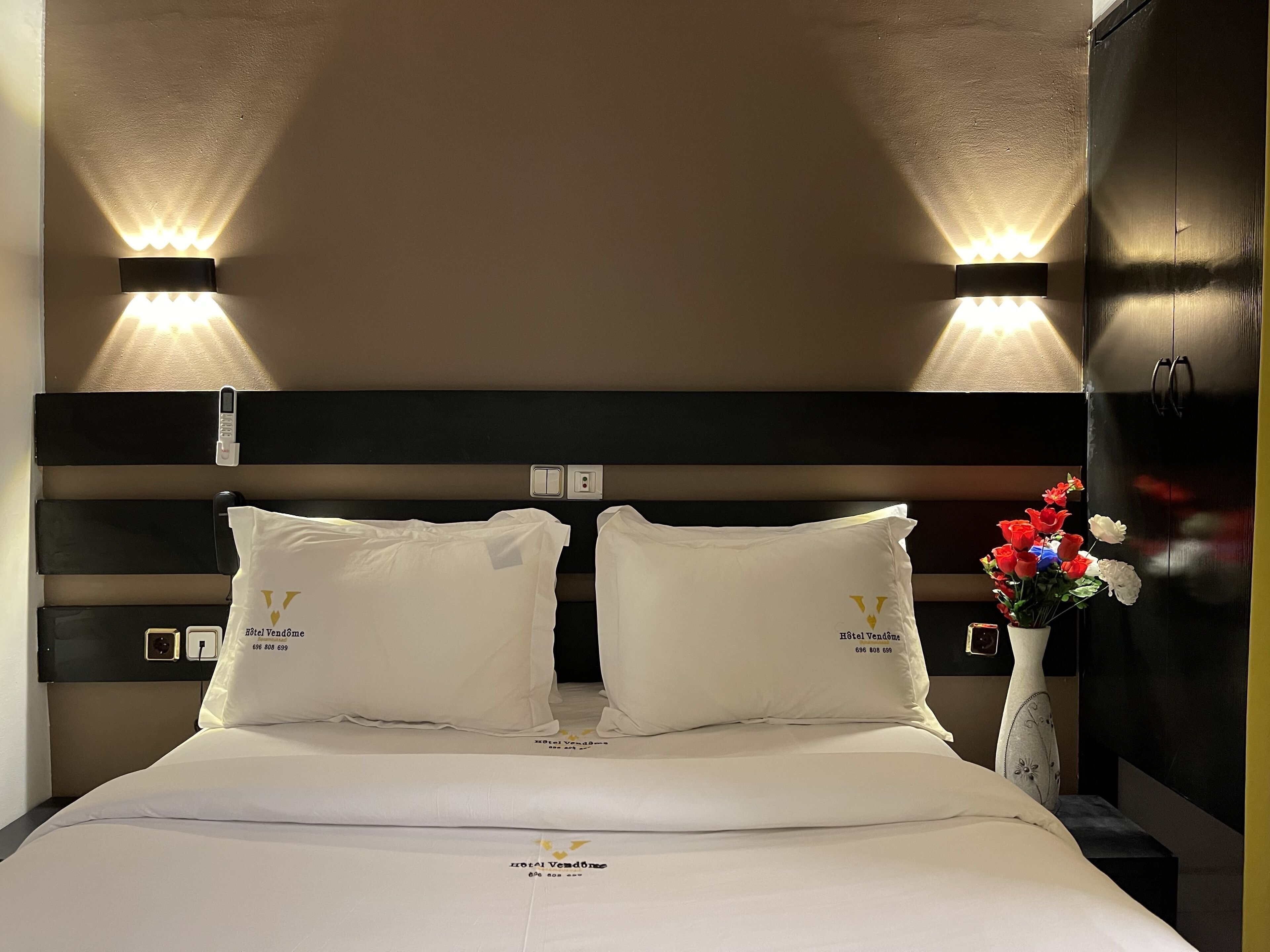 Premium bedding, down duvets, Select Comfort beds, in-room safe