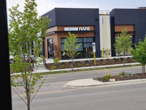 A building with a sign reading "MEDIUM RARE".
