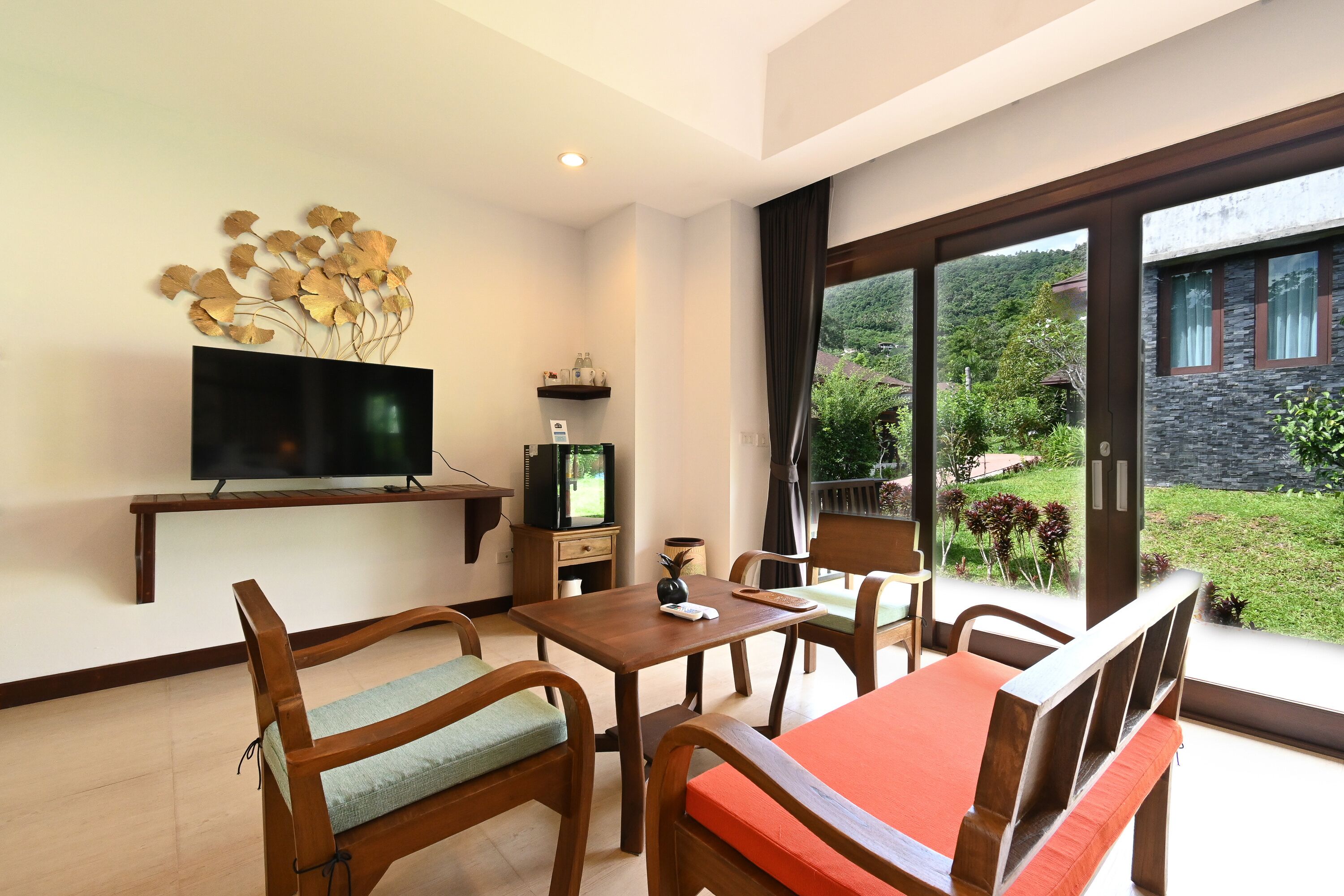 2 Bedroom Suite Villa | Living area | 34-inch Smart TV with satellite channels, TV