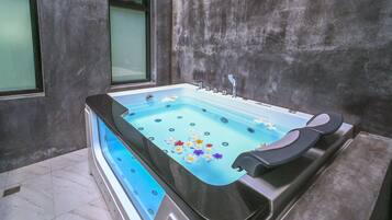 2 Bedroom Jacuzzi Villa | Bathroom | Separate bathtub and shower, rainfall showerhead, free toiletries