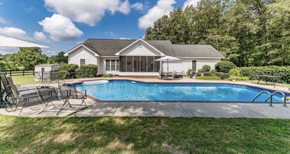 Southern Sunset, gorgeous front porch with pool.
