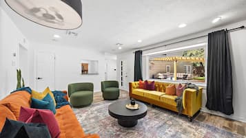 TV, fireplace, books, offices
