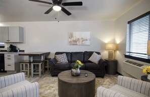 Exclusive Condo | Living area | 55-inch Smart TV with cable channels, TV, Netflix - CK Stay Hotel (Butte)