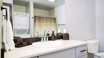 Exclusive Condo | Bathroom | Shower, free toiletries, hair dryer, towels