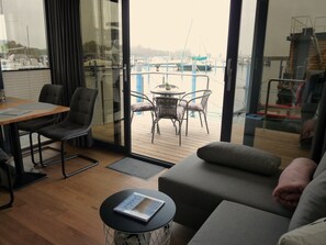 TV - Houseboat Fjord Lyra with bio sauna and roof terrace in Barth (Barth)