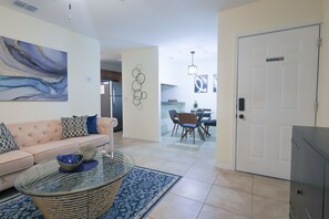 Business Apartment Unit 6 | Living area | 40-inch Smart TV with cable channels, TV