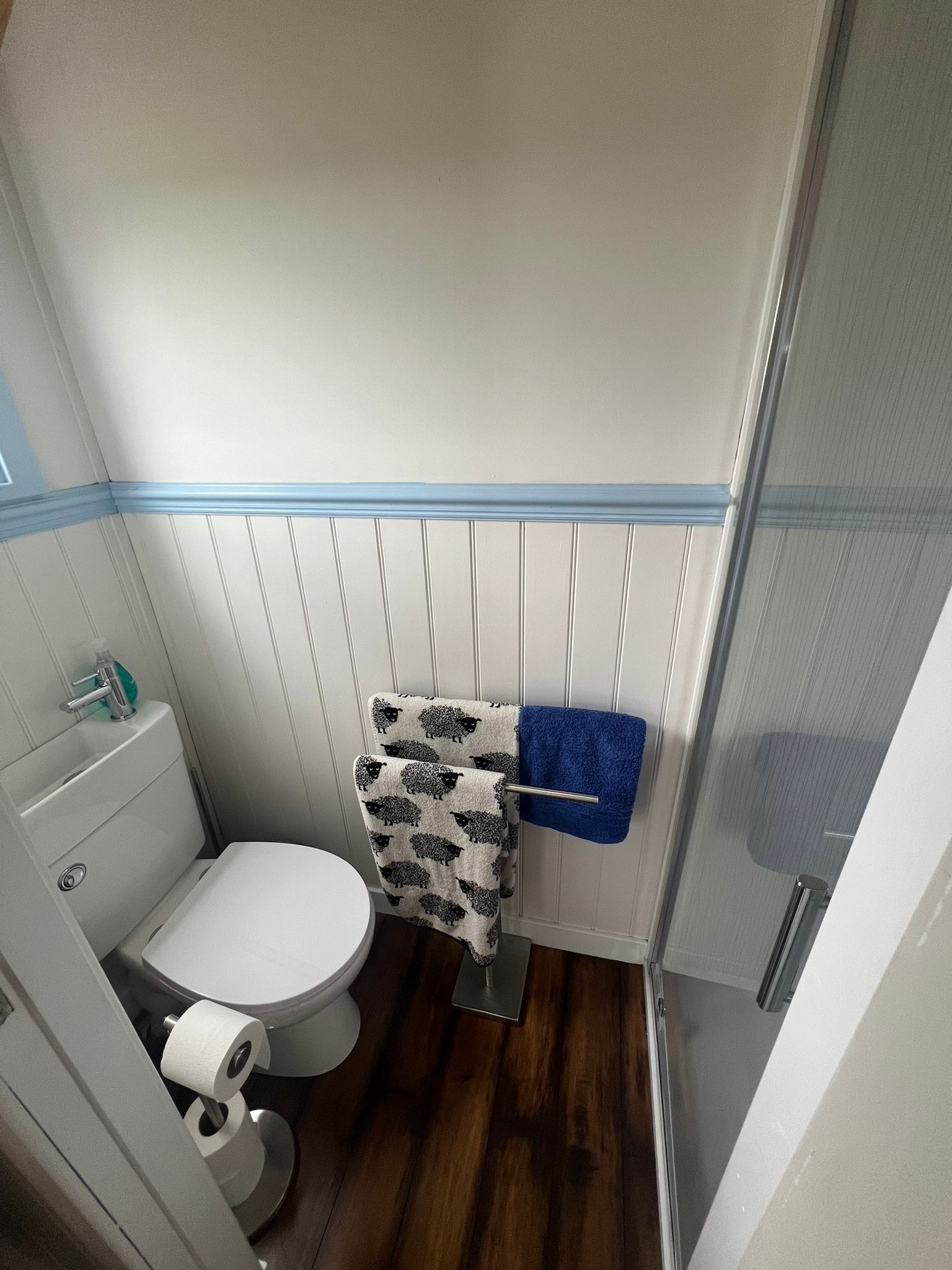 Shower, towels, soap, toilet paper