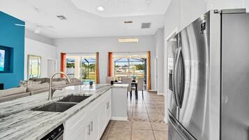 House (4 Bedrooms) | Private kitchen | Microwave, oven, stovetop, dishwasher