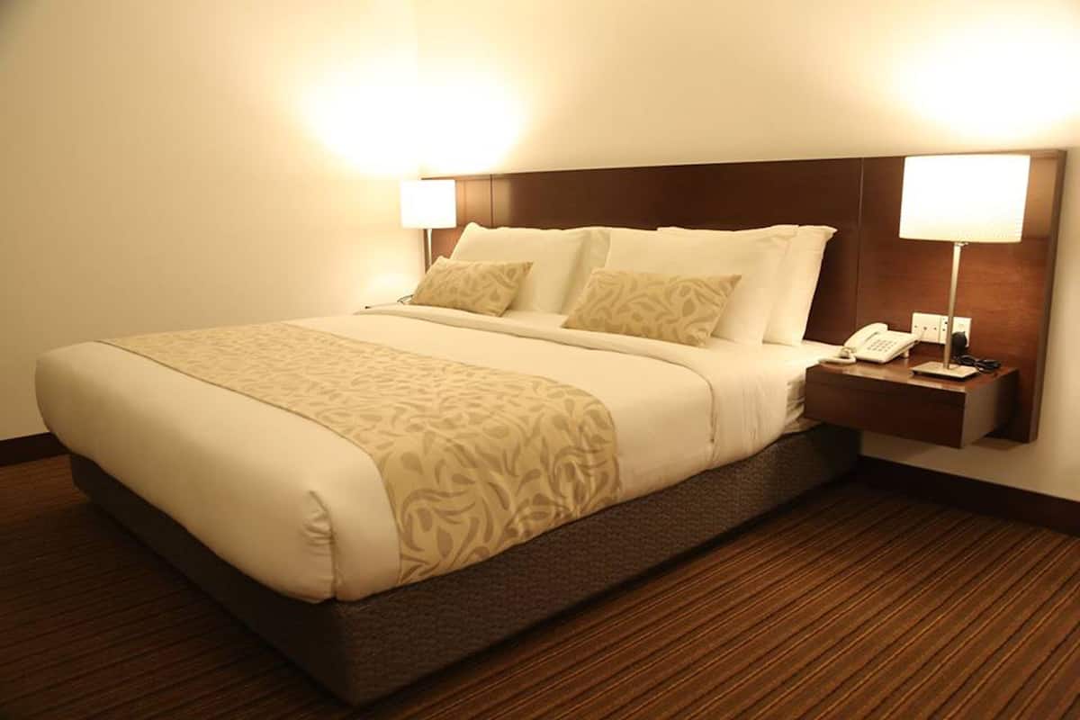 Deluxe Room | 1 bedroom, desk, bed sheets