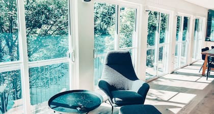 Nordic Style Private Riverfront Cottage with Heated Pool & Hot Tub