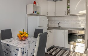 Fridge, stovetop, coffee/tea maker, cookware/dishes/utensils